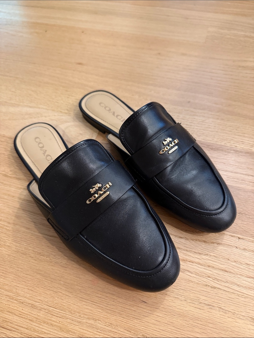 Coach Black Leather Slip-On Backless Loafers with Gold Logo